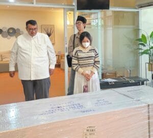 George Edwin Sugiharto bantu pemulangan jenazah Tasmi pekerja migran Indonesia dari Malaysia.